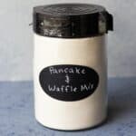 D I Y pancake and waffle mix in a canister with a label.