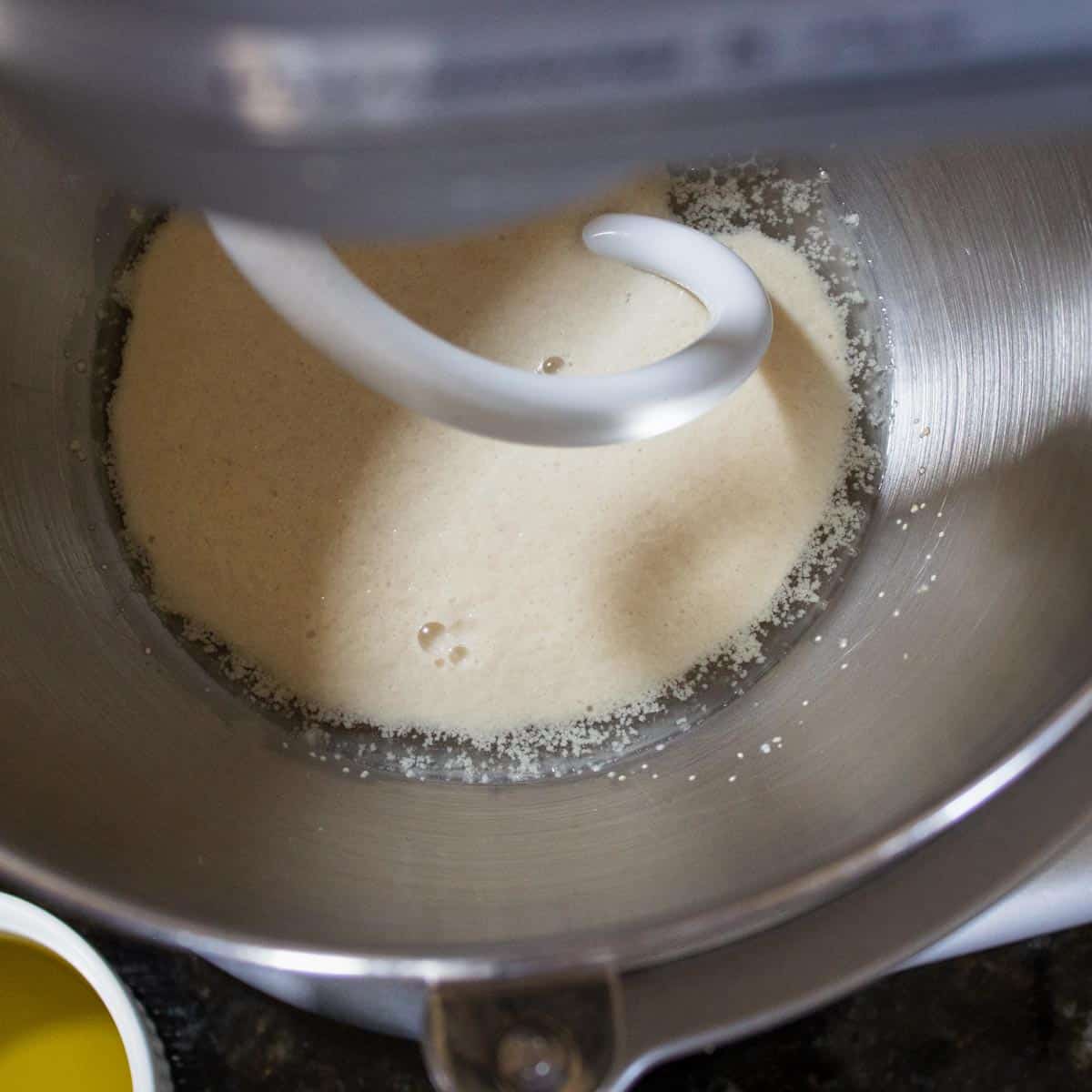 Yeast activated in the bowl of a stand mixer.