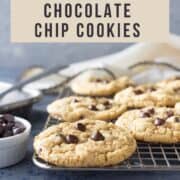 Whole wheat chocolate chip cookies on a cooling rack with text overlay.
