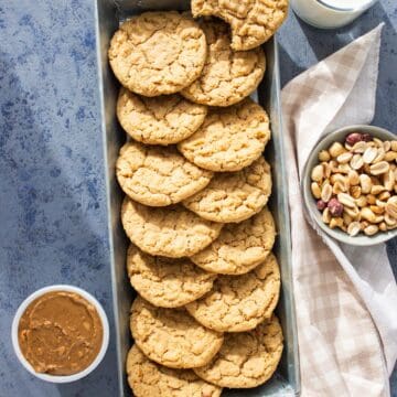 Whole wheat peanut butter cookies arranged in a long narrow tray.