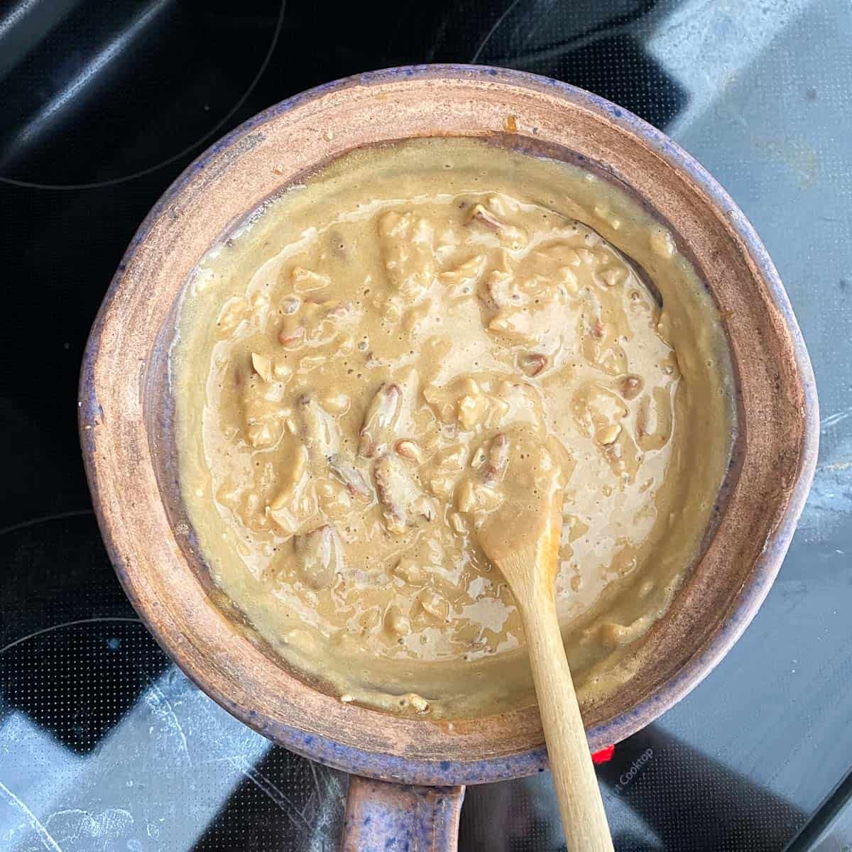 Coconut pecan frosting in a pot.